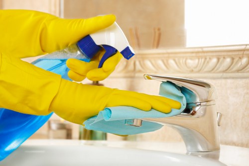 Detailed post-construction cleaning of surfaces and fixtures